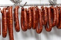 Chorizos cured and hung in strings