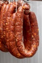 Chorizos cured and hung in strings