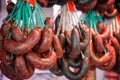 Chorizos and sausages hanging in a butchery