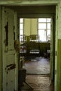 Bedroom in abandoned kindergarten. Aftermath of Chornobyl nuclear catastrophe