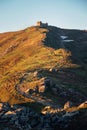 Mountain range with abandoned observatory on its top