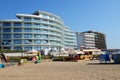 The modern hotel, tourists and beach