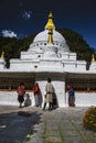 Chorten Kora stupa , people rolling the prayer wheels , Trashiyangtse District , eastern Bhutan