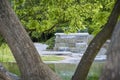 Chorzow, Poland - June 20, 2023: Japanese garden in the Silesian park. A granite cascade with a waterfall and a viewpoint