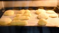 Choux cream baking in oven. Time lapse footage of cooking Eclaire Vanilla cream.