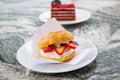 Choux cream, profiteroles with cream, and strawberry Royalty Free Stock Photo