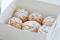 Choux cream or cream puff, eclair in the box Royalty Free Stock Photo