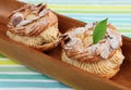 Choux Pastry in wooden plate Royalty Free Stock Photo