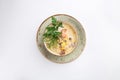 Chowder with salmon, potatoes and corn in ceramic bowl isolated on white background Royalty Free Stock Photo