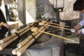 Chozusha or Holy water in wash hand stone basin for people washing before go to inside japanese temple or Mitarashi ritual