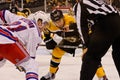 Chris Kelly v. Derek Stepan faceoff Royalty Free Stock Photo