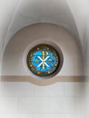 Chrism on stained glass in a church Royalty Free Stock Photo