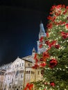 Chrismas tree, Duomo catholic cathedral and Ghirlandina bells tower seen from Piazza Grande
