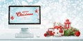 Chrismtas composition with computer display and Christmas decorations Royalty Free Stock Photo