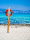 Chrissi Island, Crete, Greece. A lifebuoy on the Golden Beach, symbol of assistance, security, rescue, SOS Royalty Free Stock Photo