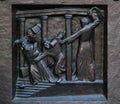 Christ Driving the Merchants from the Temple, relief on the door of the Grossmunster church in Zurich Royalty Free Stock Photo