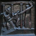 Christ Driving the Merchants from the Temple, relief on the door of the Grossmunster church in Zurich Royalty Free Stock Photo