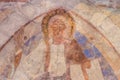 Christ pantocrator rises his right hand, an ancient romanesque m