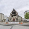 Building site fence and collapsed facade of Cathedral, Christchurch, New Zealand