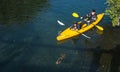 Christchurch, New Zealand - October 03 2017: Asian couple kayaking on the Avon river of Christchurch, New Zealand. Royalty Free Stock Photo