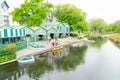 Punting on Avon green and white Antigua Boat Sheds