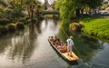 Christchurch, New Zealand - October 03 2017: Tourist enjoying with Punting on the Avon River one of the top tourist attractions an Royalty Free Stock Photo