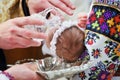 Christening newborn in church