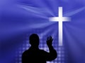 White Cross on Blue Background with Man Preaching Royalty Free Stock Photo