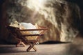 Christian Christmas concept. Birth of Jesus Christ. Wooden manger in cave background. Banner, copy space. Nativity scene Royalty Free Stock Photo