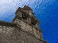 Christian church bell tower with clouds and sky at background Royalty Free Stock Photo