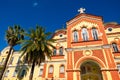 Christian church exterior. Palms garden and sky New Athos Monastery 1875 year built, Abkhazia Royalty Free Stock Photo