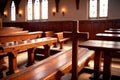 Christian church interior background with wooden furniture and cross