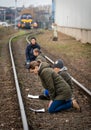 Christian climate activists blocking the rail tracks and praying during the protest action