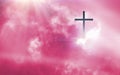 Christian cross appeared bright in the sky with soft fluffy clouds The Christian cross looks bright in the golden sky, with soft w Royalty Free Stock Photo
