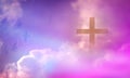 The crucifix floats in the sky with the light shining as hope, love and freedom in the sky background. Royalty Free Stock Photo