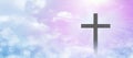 The Christian cross appears bright in the pastel sky, with a soft, fluffy white cloud, with light that shines as a beautiful backg Royalty Free Stock Photo