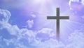 The Christian cross appears bright in the pastel sky, with a soft, fluffy white cloud, with light that shines as a beautiful backg Royalty Free Stock Photo