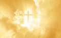 Christian cross appears bright in the yellow sky Royalty Free Stock Photo