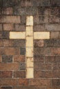Christian cross in brick wall Royalty Free Stock Photo