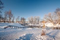 Christian cross on the coast of the winter river Royalty Free Stock Photo