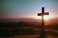 Christian cross in countryside at sunset. Christian cross in nature at sunrise. Generative AI. Royalty Free Stock Photo
