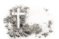 Christian cross or crucifix drawing in ash, dust or sand