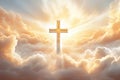 Christian cross and divine light through the clouds around cross in sky, enchanting light and peach fuzz tones on heaven Royalty Free Stock Photo