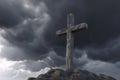 Christian cross on grey cloudy sky background announces Jesus\'s rising from the dead. Generative AI