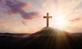 Christian cross on hill outdoors at sunrise. Resurrection of Jesus Royalty Free Stock Photo