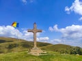 Christian cross monument in the Carpathian Mountains , Romania