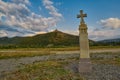 Christian Cross in Mtskheta with Jvari Monastery in Background Royalty Free Stock Photo
