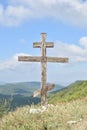 Christian cross in nature, Orthodox cross on the mountain, in the mountains stands a cross for Christians