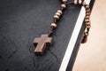 Christian cross necklace on Holy Bible book, Jesus religion concept as good friday or easter festival Royalty Free Stock Photo