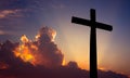 Christian cross over beautiful sunset background Royalty Free Stock Photo